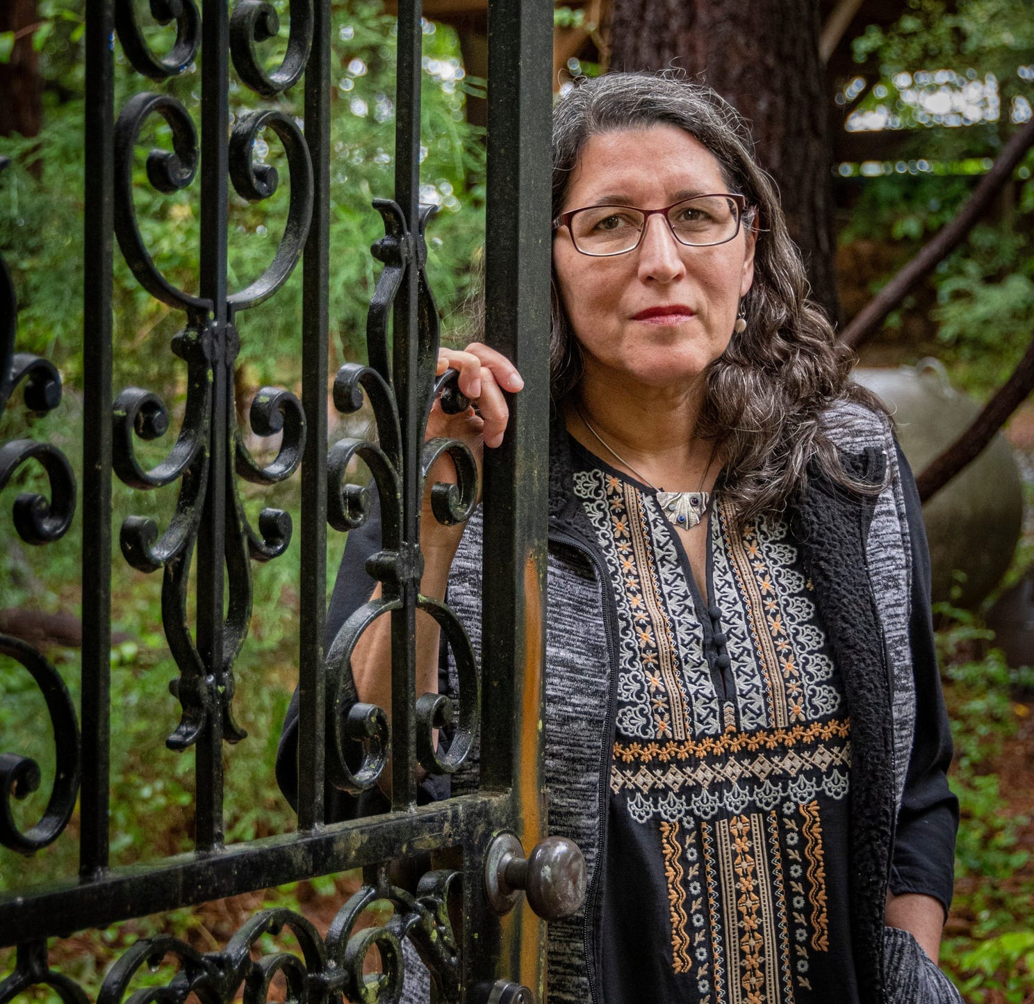 Ilana Dubester, Executive Director of The Hispanic Liasson, poses for a photo at her home in Pittsboro, NC.