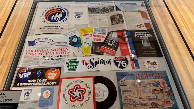 Collection of Bicentennial memorabilia displayed at the PA State Archives in 2026.