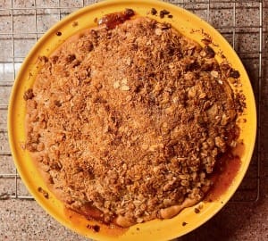 Dutch apple pie in a yellow pie plate