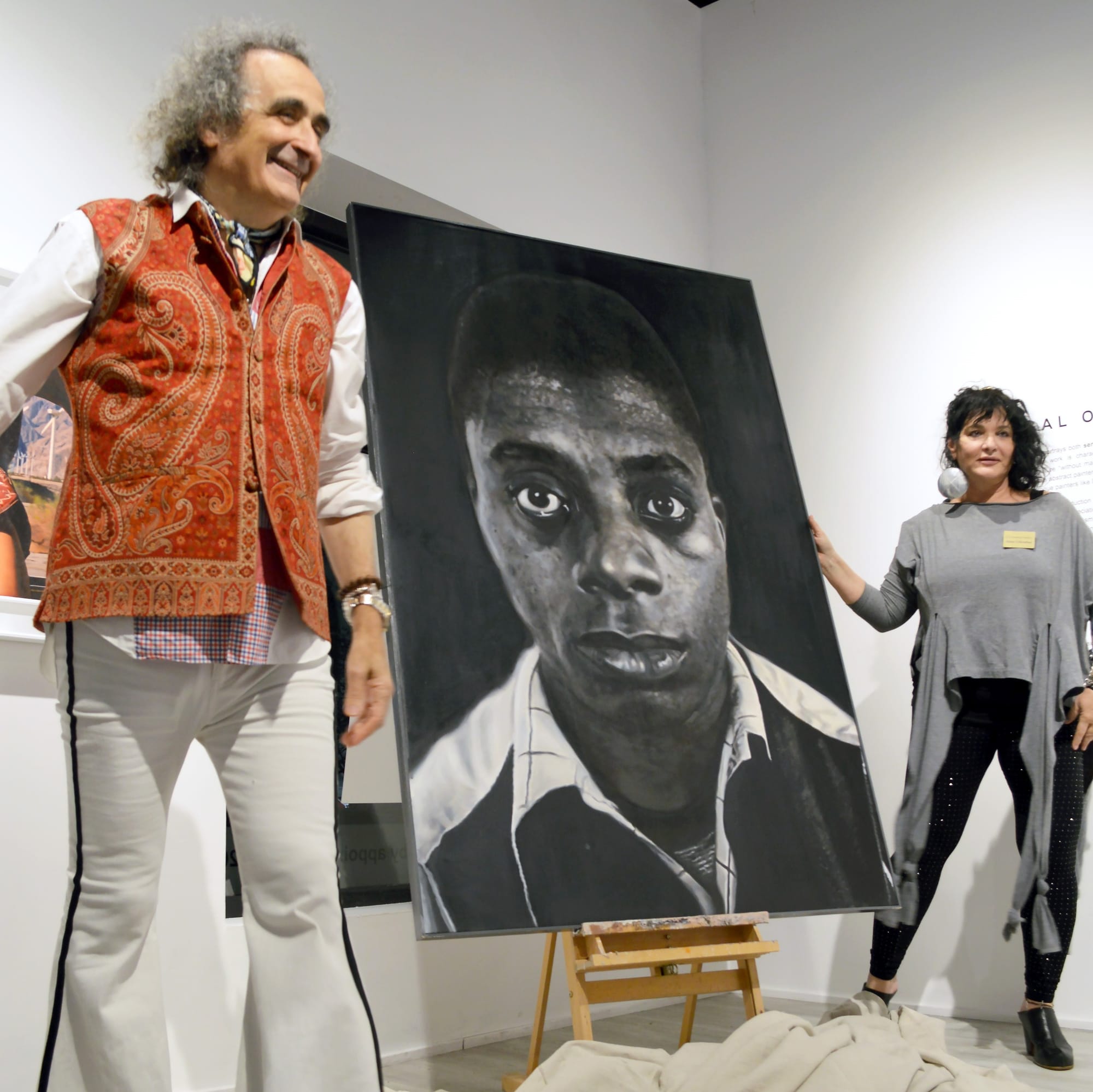 Artist Yigal Ozeri with gallery owner Ilana Lilienthal presenting “James Baldwin” (2020) to the Knoxville Museum of Art