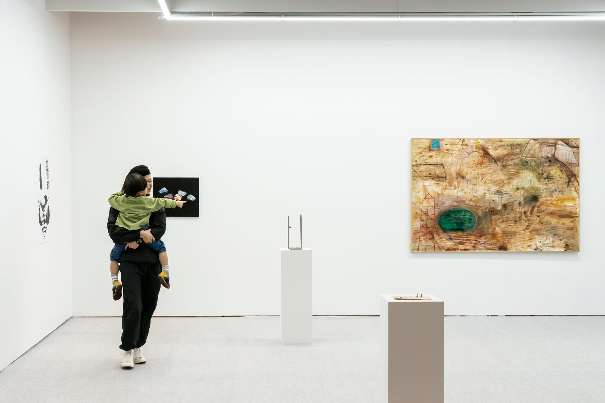 Visitors viewing artworks at Art Collaboration Kyoto.