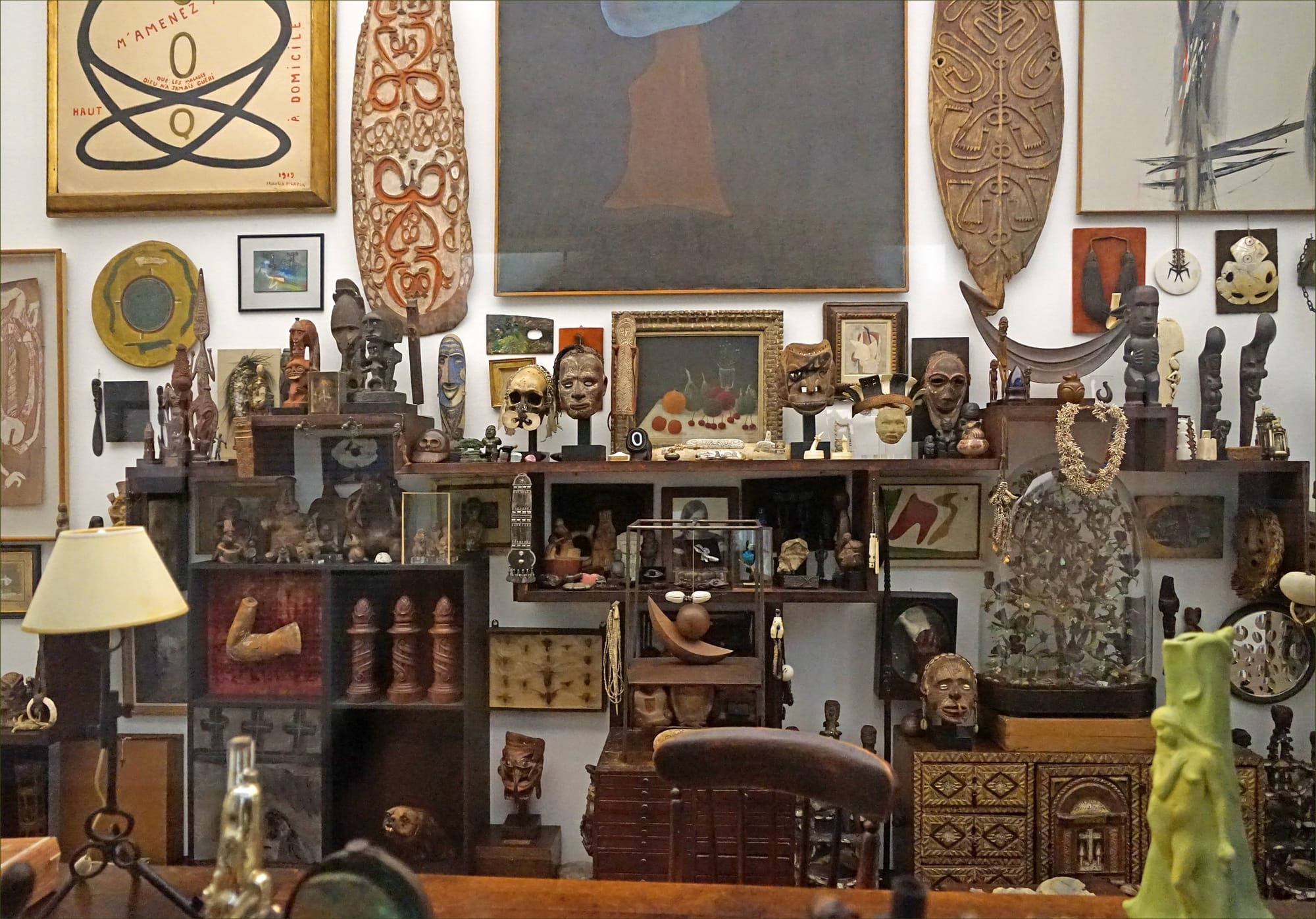 Detail of the wall in André Breton's atelier, showing the eclectic mix of objects.