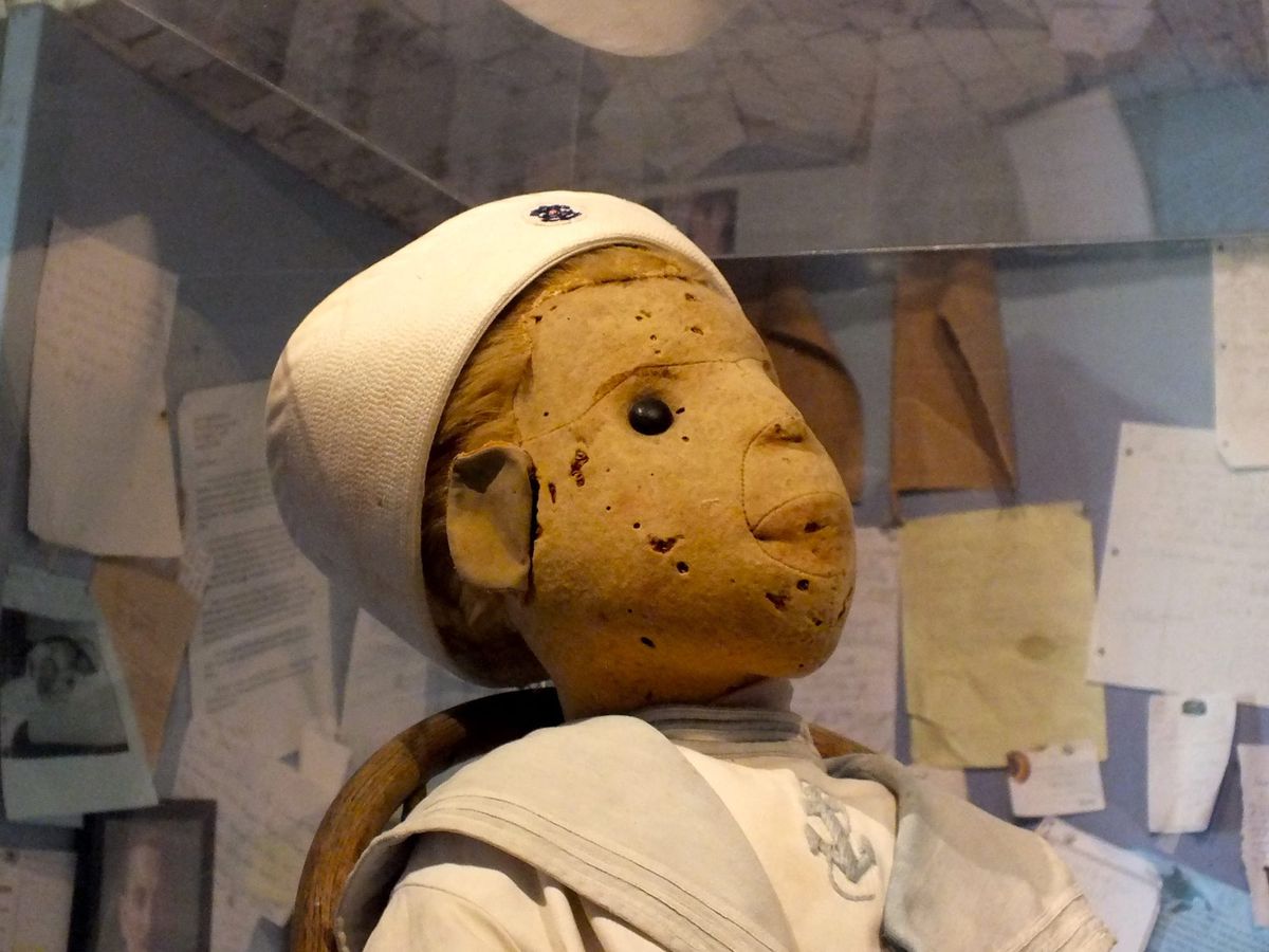Close up photo of the Otto the Doll in the display case