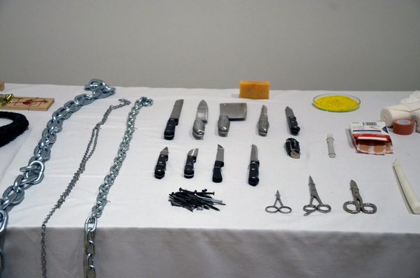 Marina Abramović's Rhythm 0 performance table with seventy-two objects, some harmless, others threatening