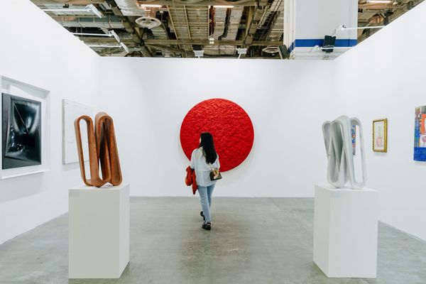 VIP preview at ART SG 2025 showing collectors and galleries in early access hours at Marina Bay Sands, Singapore.