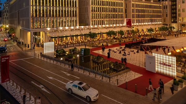 Visitors moving through Msheireb Downtown Doha between M7 and the Doha Design District during Art Basel Qatar 2026.