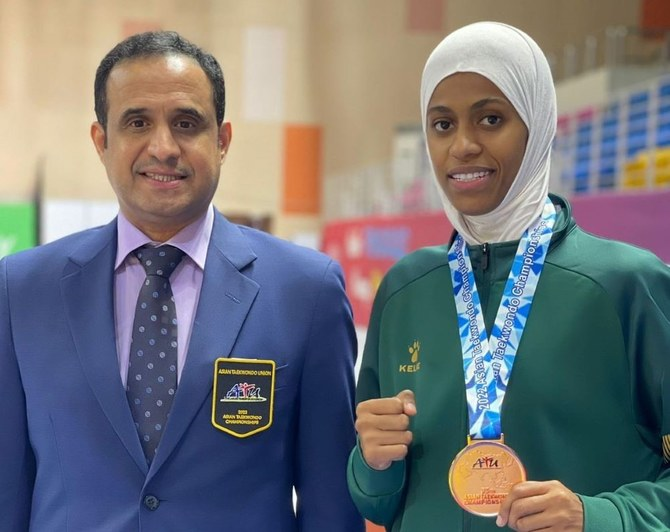 Saudi Taekwondo Federation President Shaddad Al-Omari with&nbsp;Dunya Abutaleb.&nbsp;