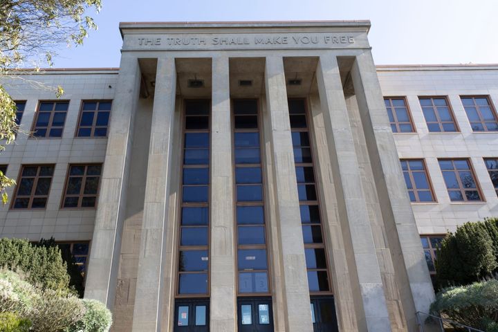 Written up high on the west entrance of Science Hall are words of spiritual wisdom.