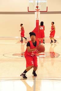 Point guard Brittney Allen focuses on her shot during a team practice Wednesday Oct. 28. ROBERT ROMANO / THE GUARDSMAN