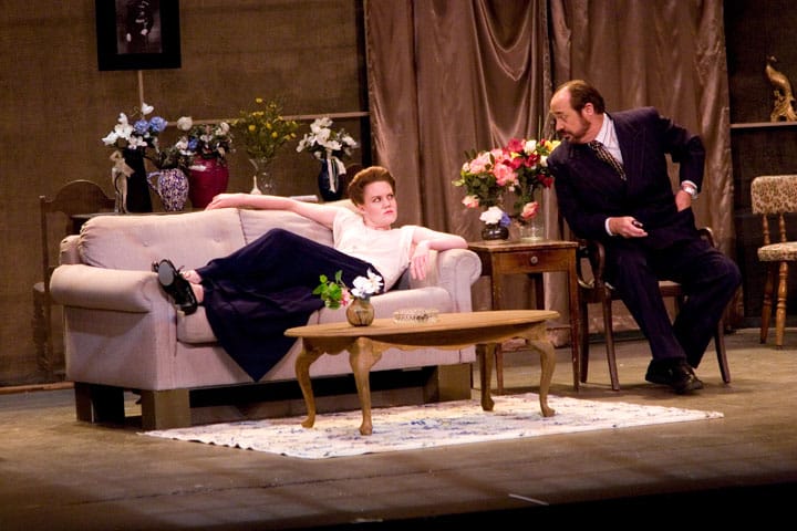 Hedda Gabler, played by Whitney Gafford and Judge Brack, played by Lance Huntley, have a 'little cozy chat.' TRISTAN CRANE / THE GUARDSMAN