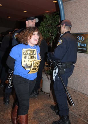 Hiton Boycott_woman arrested_l_5157