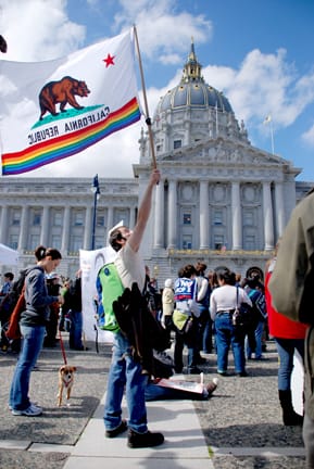 City College studetn Calros Wilson waves a state / pride flag outside the California Supreme Court Proposition 8 hearings on March 5, 2009. RAMSEY EL-QARE / THE GUARDSMAN ARCHIVE PHOTO