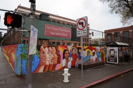 DSC_1120 A mural titled "Educate to Liberate" at the corner of Hayes Street and Masonic Avenue frames the recently renovated campus. Infrastructure, brick and cosmetic repairs as well as seismic and electrical upgrades forced some classes at John Adams to move to DeAvila Middle School. ROBERT ROMANO / THE GUARDSMAN