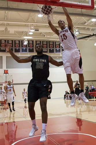 San Francisco Rams freshman guard Gabe Bealer (25) dunks the ball against the Ohlone College Renegades in a CCCAA men’s basketball game on Ocean campus, Friday, Feb. 22, 2014. The Rams won the game 71-63, finishing the regular season 12-0 undefeated. They won the Coast-North Conference title and will compete in playoffs next week. Photo by Santiago Mejia/The Guardsman