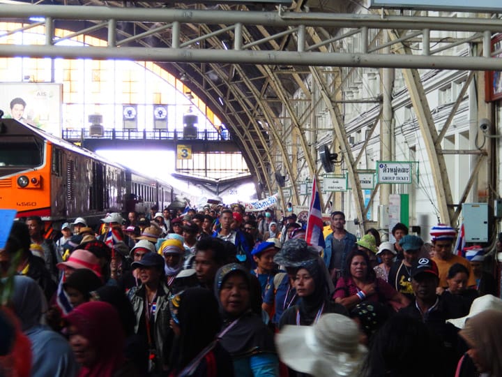 Hundreds of protesters at the Hula Lamphong train station rallied in Bangkok, Thailand, Saturday, Dec.21, 2014, opposing their prime minister's political actions.