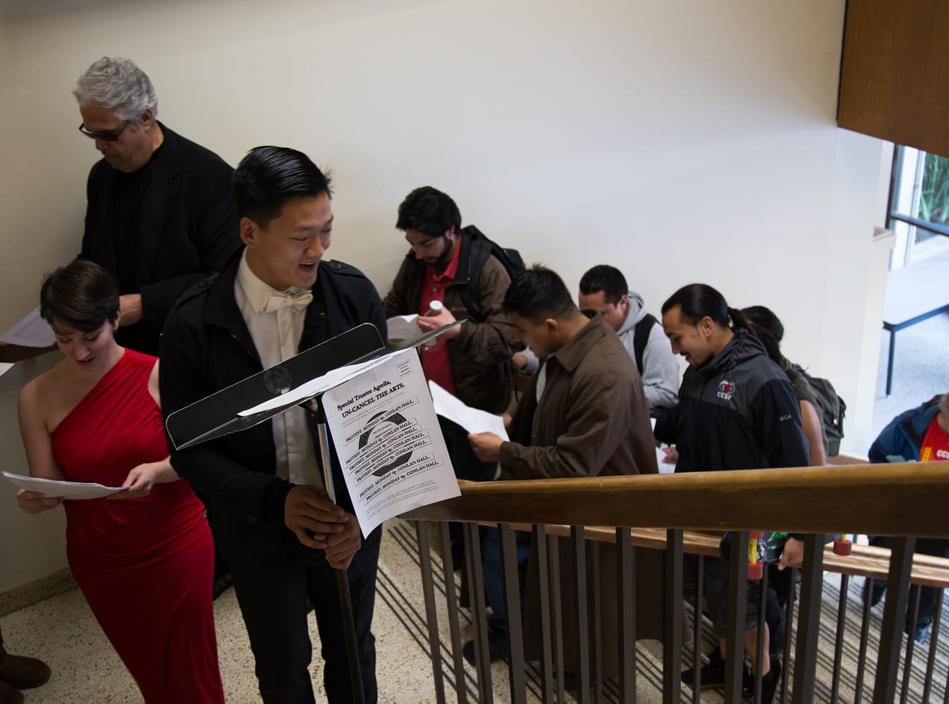 Members of the Performing Arts Education Club marching inside Conlan Hall, protesting for the installment of the $88 million Performing Arts Education Center, in the form of singing a song. City College, San Francisco. January 12, 2015. (Photo by Natasha Dangond)