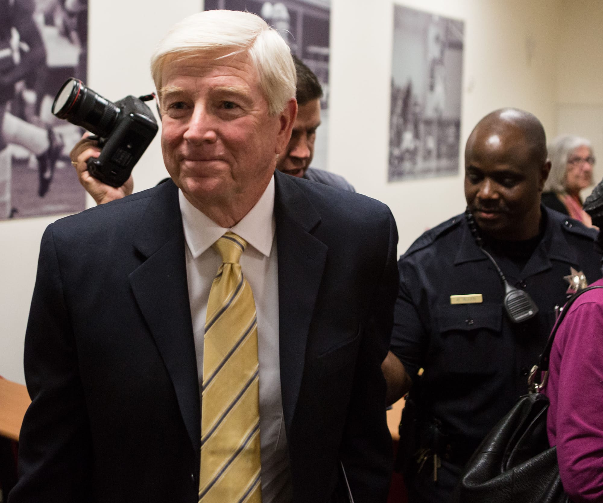 New Special Trustee Dr. Guy Lease leaves the press conference escorted by campus police out of the Wellness Center, Ocean Campus, Monday, Feb. 23. (Photo by Khaled Sayed)