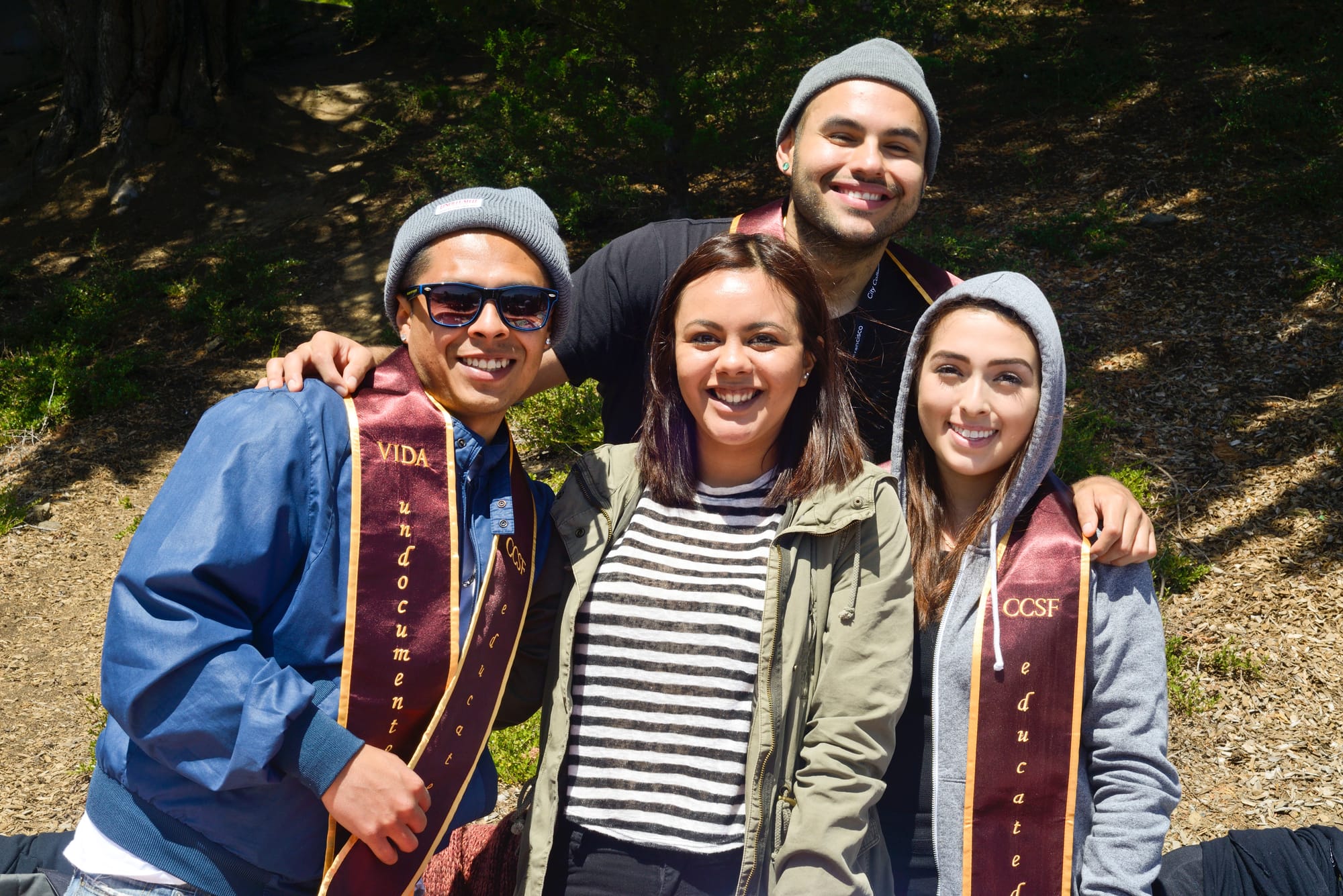 (From left to right) Christian Arevalo,  Martha Garcia, Edgar Lara and Alma Ramos pose for a picture on their VIDA table on Frisco Day at City College on Friday April 24, 2015.  