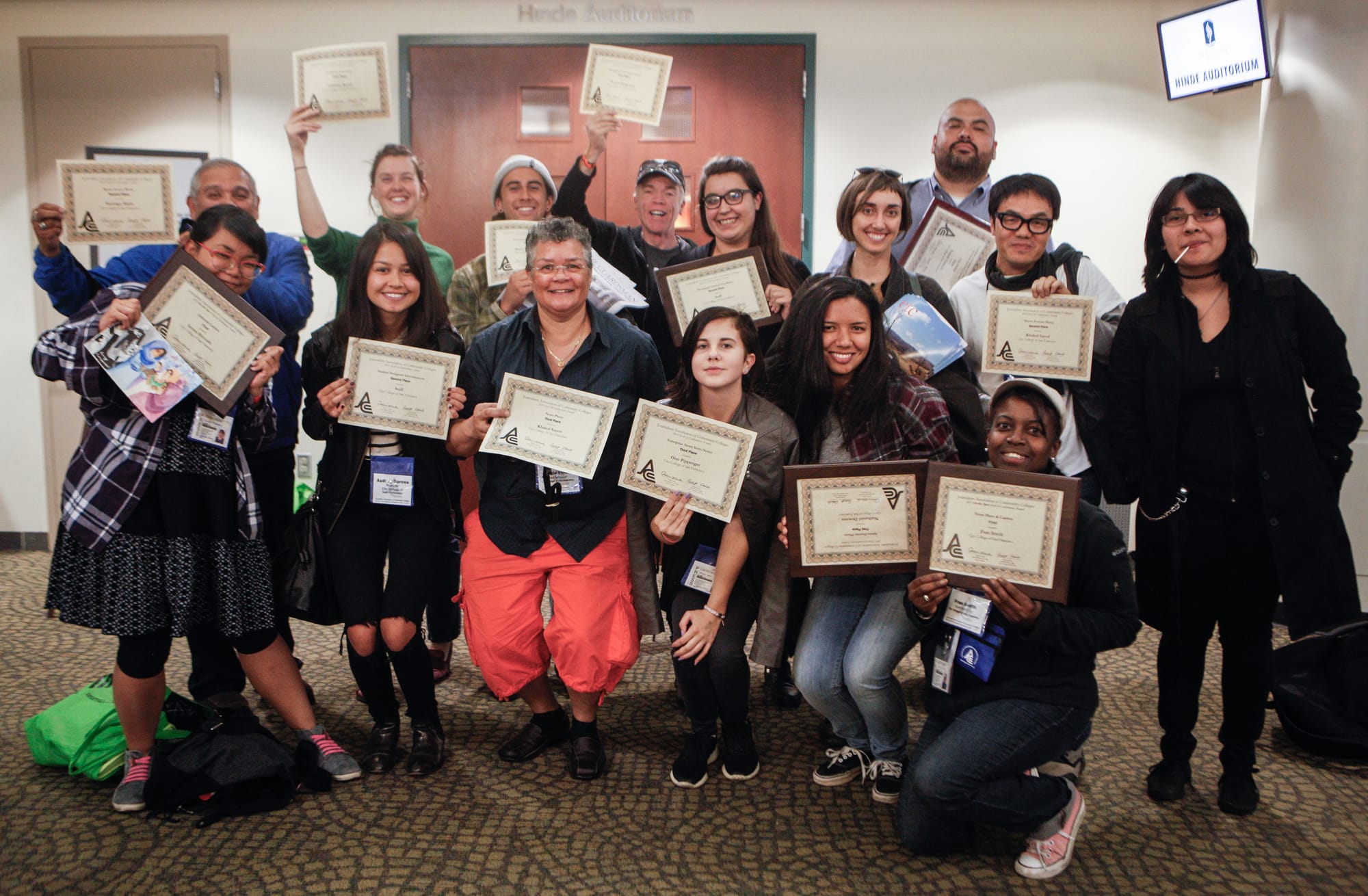 The Guardsman staff stand with their 11 awards from the 2015 JACC conference after the ceremony on Saturday, Nov. 7, 2015. (Photo by Fran Smith/The Guardsman)