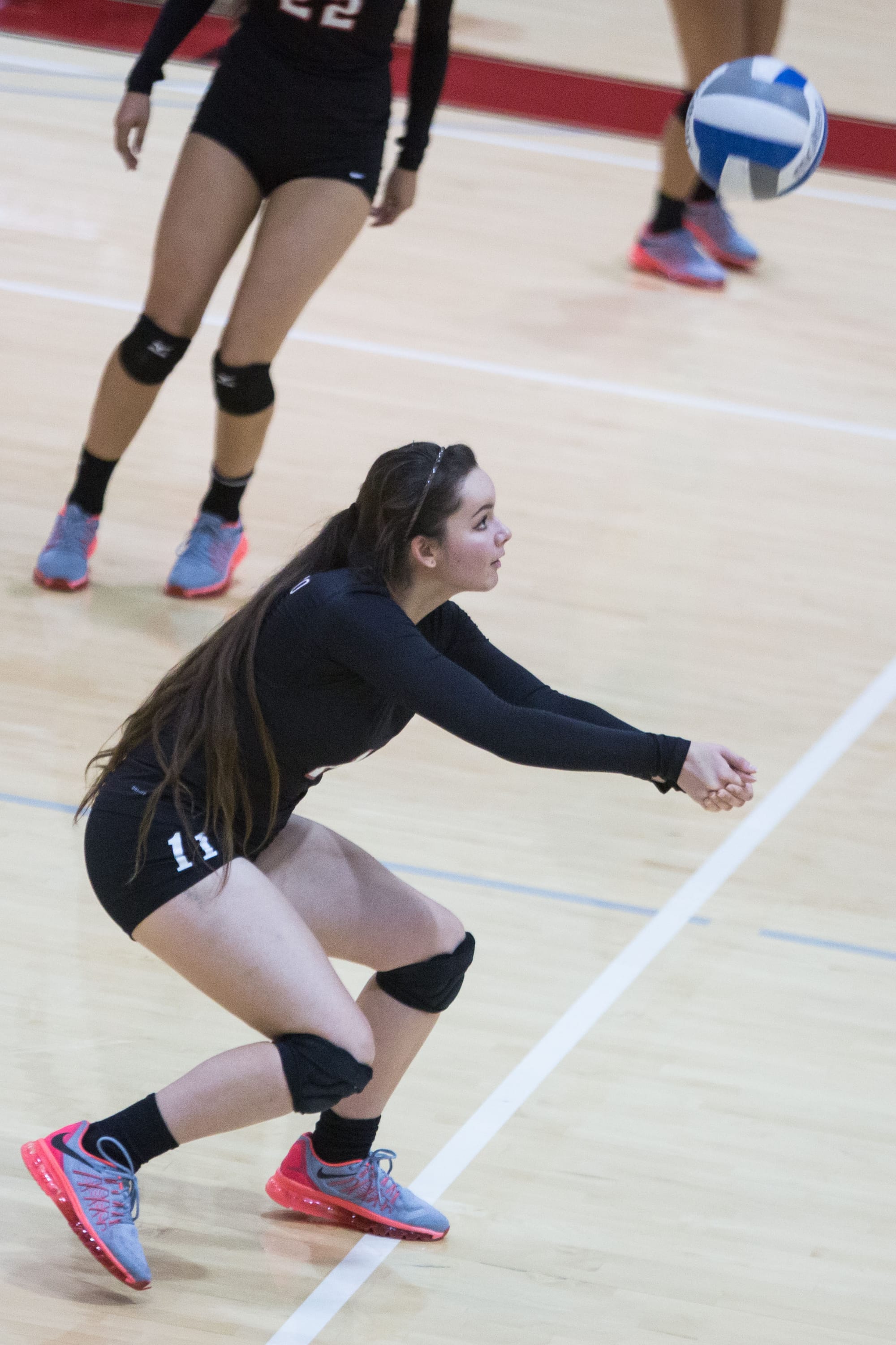 City College’s Sierra Stark (11) receives the ball from a Monterey Peninsula College player at City College court at Ocean, Nov 13 ( Khaled Sayed