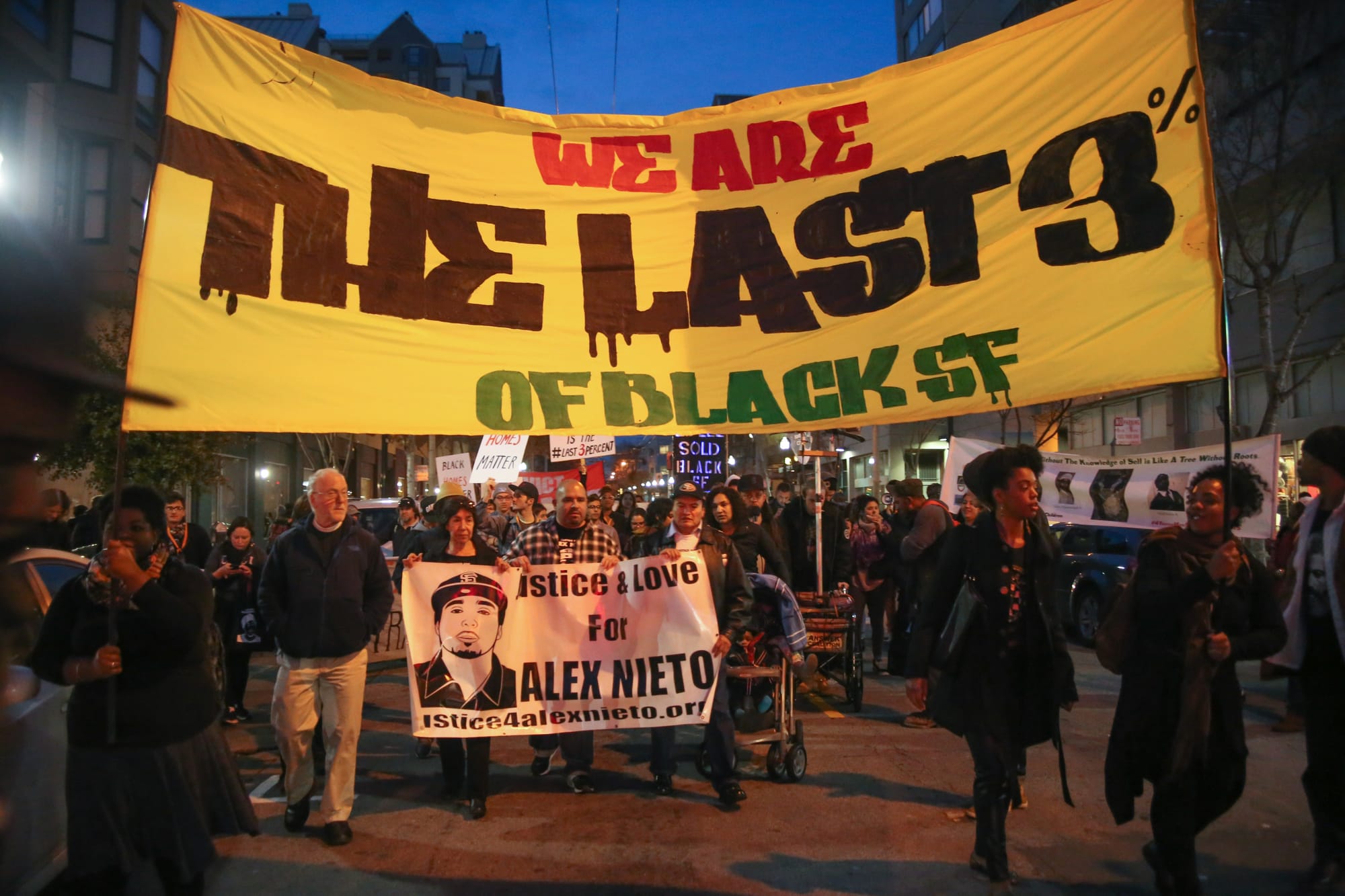Protesters march down the Fillmore district during a demonstration against displacement of minority communities in San Francisco and to demand justice for the family of Mario Woods in San Francisco on Jan. 15, 2016. (Photo by Joel Angel Juarez/ Special to The Guardsman)