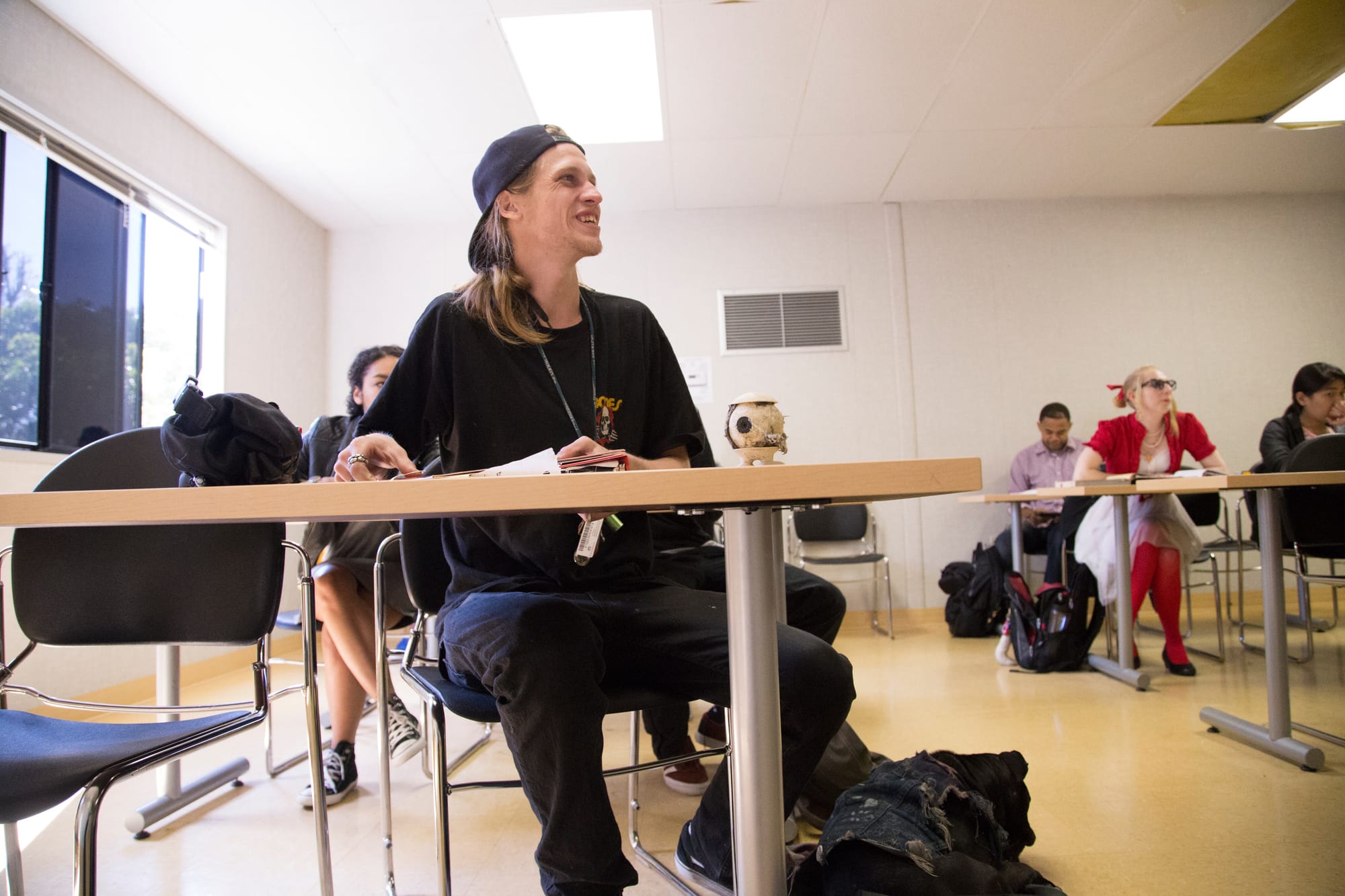 Ziggy waits for Lindley’s Spanish class to start at Ocean Campus on Tuesday, Feb. 16, 2016. They have been best friends for 2 years. (Photo by Gabriella Angotti-Jones/The Guardsman)
