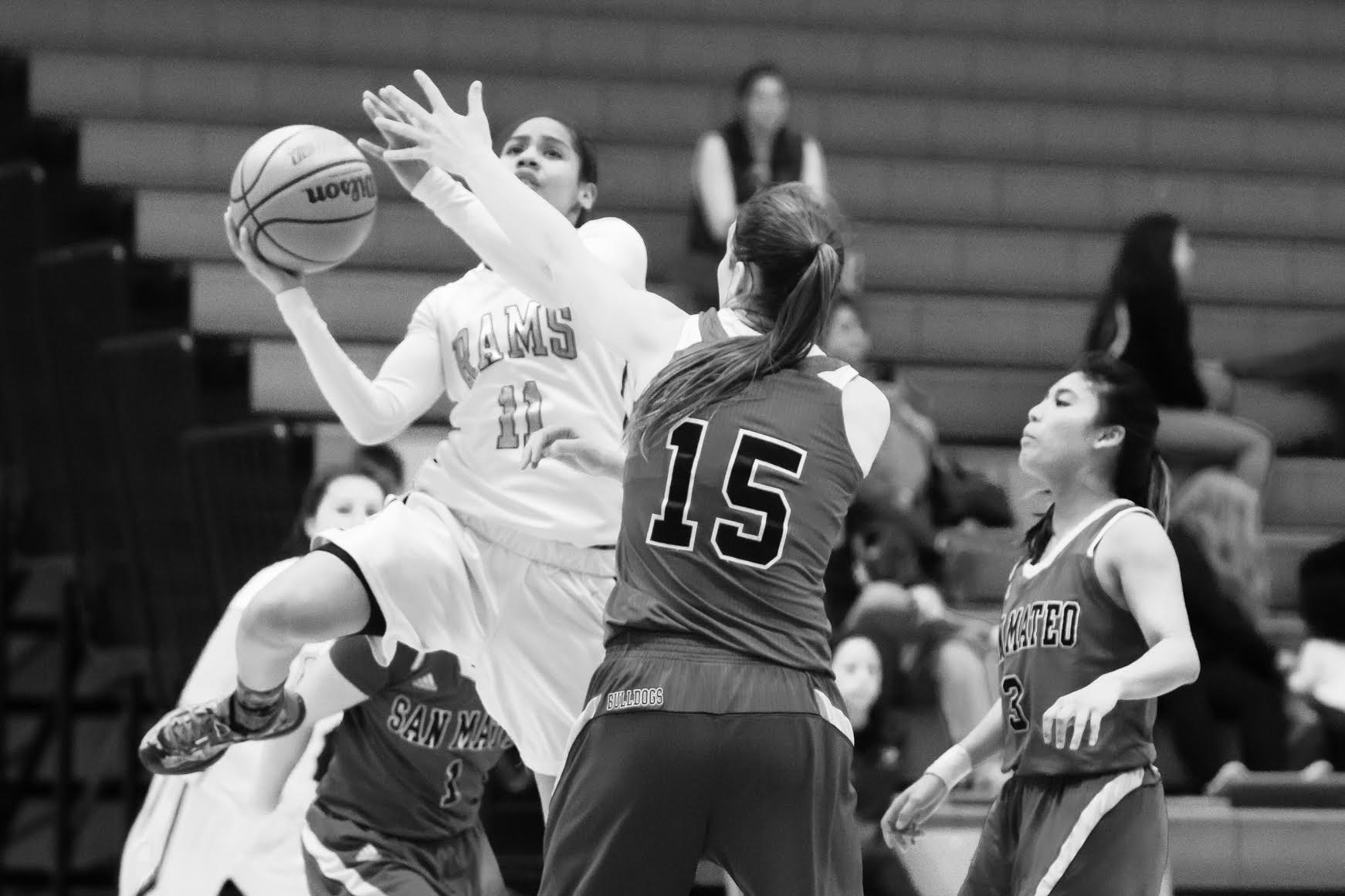Gabriello Vigil (11) freshman guard soaring past San Mateo players for a score. CCSF vs. San Mateo College - Feb. 5, 2016. (Photo by Peter Wong/ Special to The Guardsman)