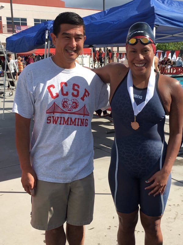 Coach Pham poses with Daniela Fiestas-Paredes following her third place swim in the 200-yard butterfly. (Photos courtesy of CCSF Athletics)