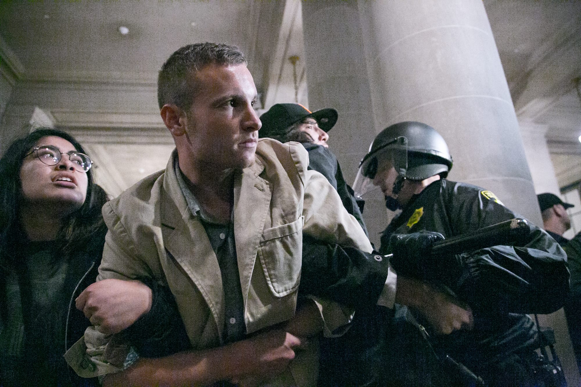 A protester is arrested during a Hunger for Justice SF occupation of City Hall last night. 33 people were arrested. Protesters demanded action against police brutality and for SFPD Chief Suhr to be fired. (Photo by Gabriella Angotti-Jones).Justice SF occupation of City Hall last night. 33 people were arrested. Protesters demanded action against police brutality and for SFPD Chief Suhr to be fired. (Photo by Gabriella Angotti-Jones).