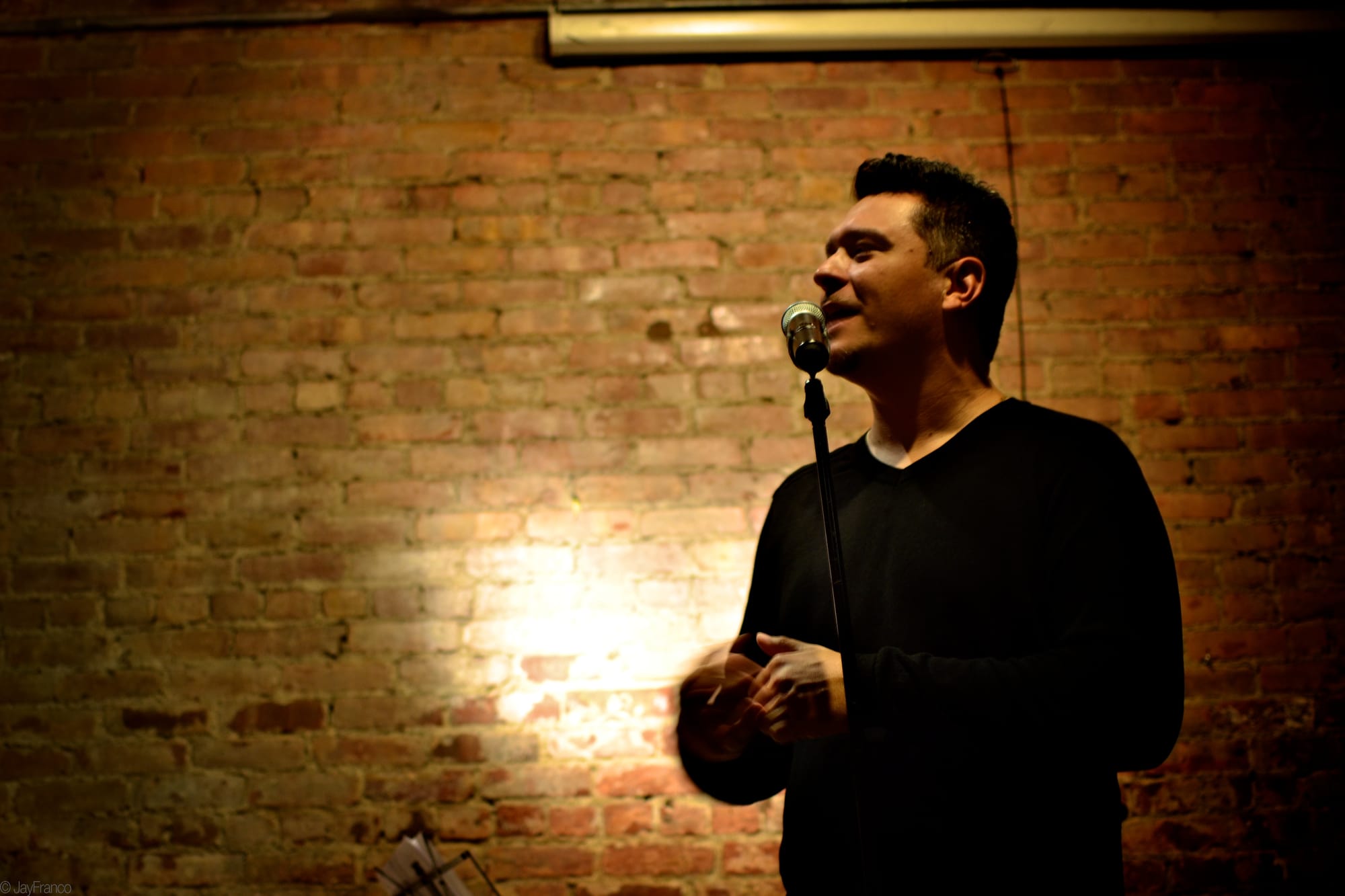 Director Paul S. Flores speaking to the audience of his play "On the Hill: I am Alex Nieto".