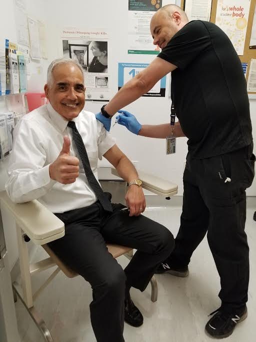 City College's Chancellor Dr. Rocha got his flu shot by a nurse practitioner at the Student Health Center on Monday, October 16, 2017. 