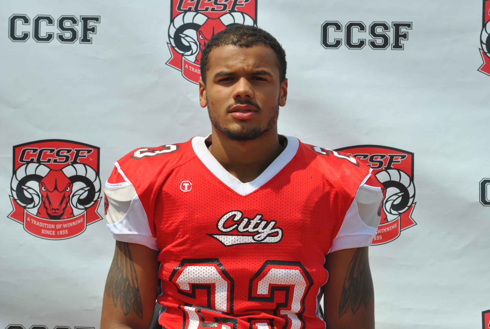 Defensive End Jordan Allen (#23) signs with University of Tennessee. Photo courtesy of CCSF Athletics Department. 