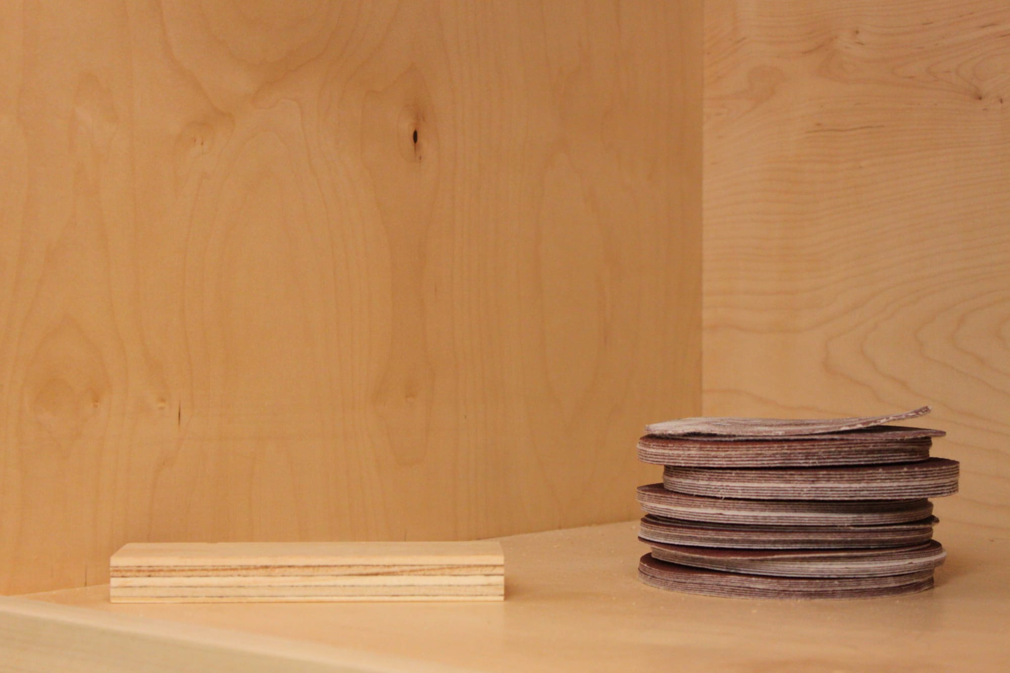 Stashed inside the third segment of Cem Turhal’s half-finished project is a stack of sandpaper. Other students in Turhal’s class made much smaller, detailed pieces but Turhal’s class project will have to leave the campus in a truck. Photo taken by Bethaney Lee on Nov. 6, 2017. 