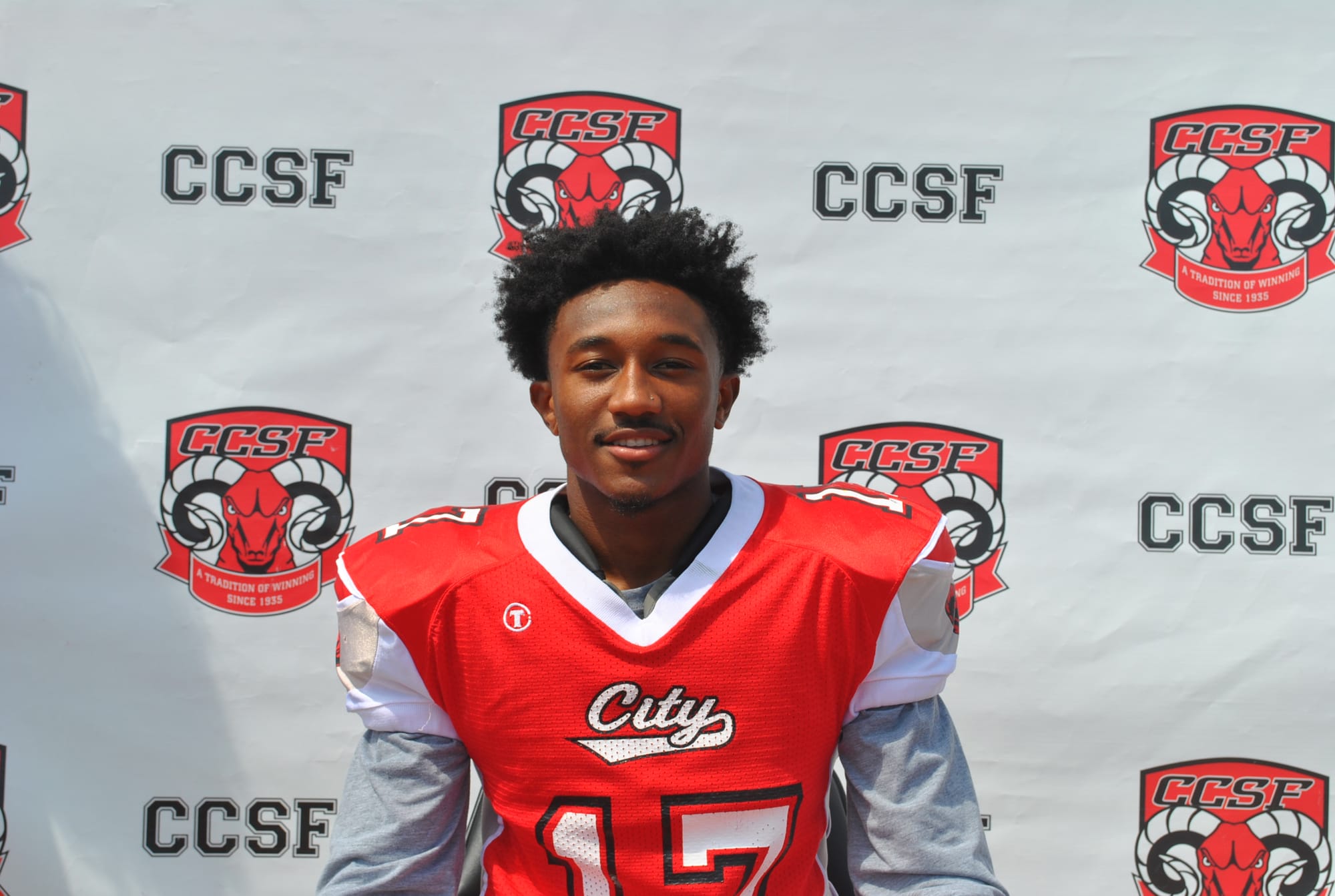 Defensive Back Bejour Wilson (#17) both sign with Liberty University. Photo courtesy of CCSF Athletics Department. 
