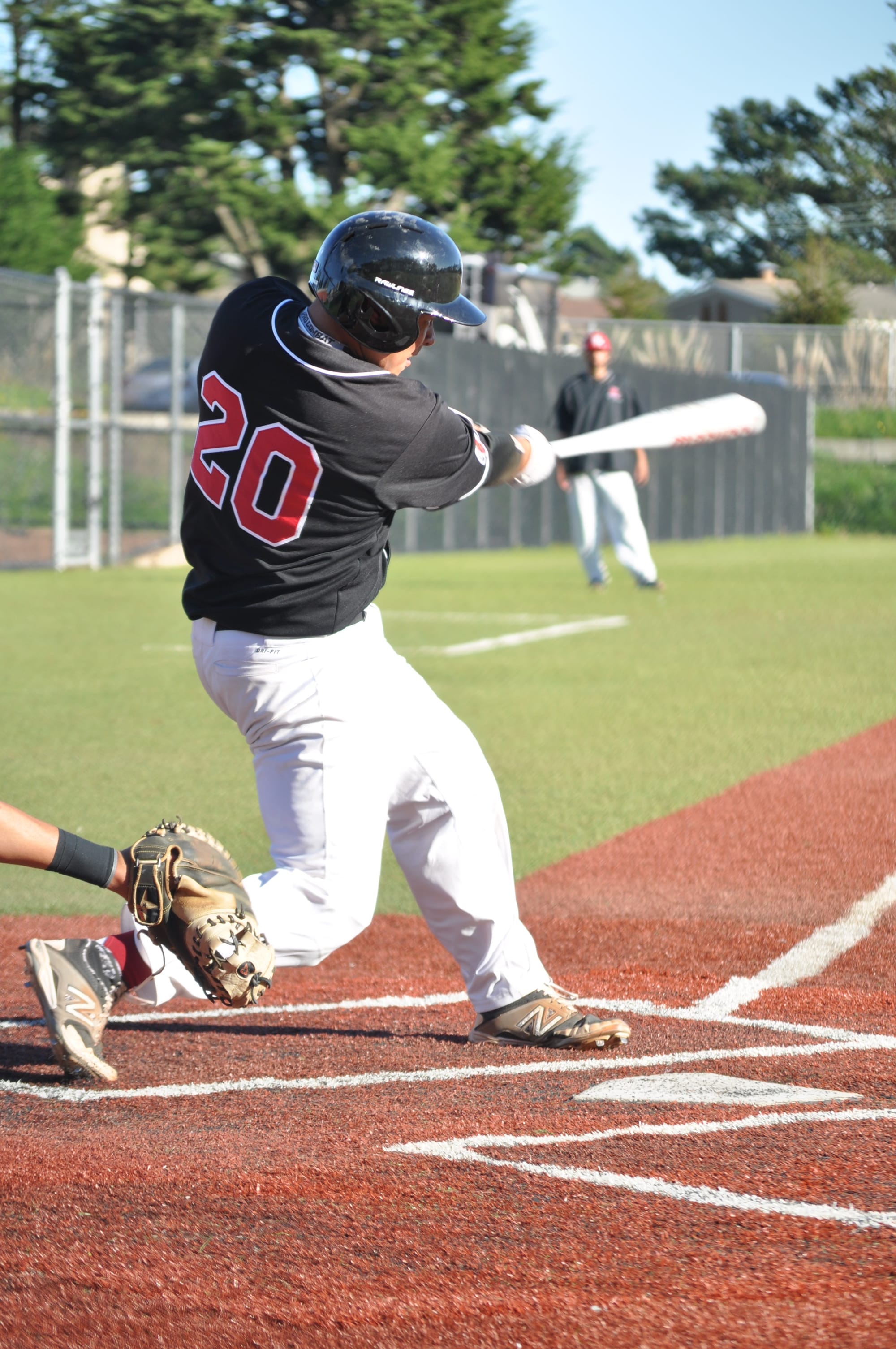 City College Men's baseball catcher Bobby Chu singles a ground ball past the Gavilan in-field on Feb. 3, 2018. Photo by Peter J. Suter/The Guardsman.