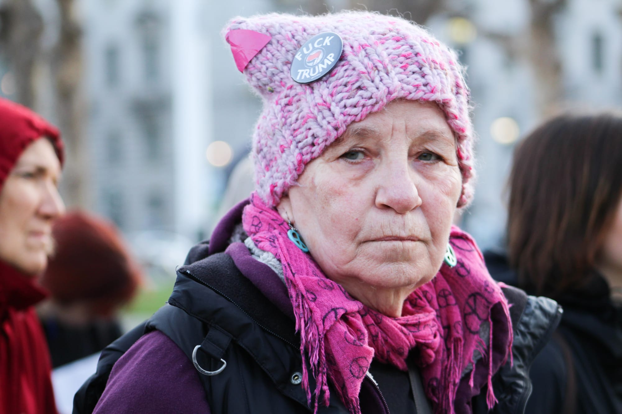 "I'm anti-war and a feminist," said 74-year-old Nancy Keiler of Code Pink, an organization dedicated to issues of peace and social justice, at Civic Center Plaza in San Francisco on March 8, 2018. Photo by Adina J. Pernell/Special to The Guardsman.
