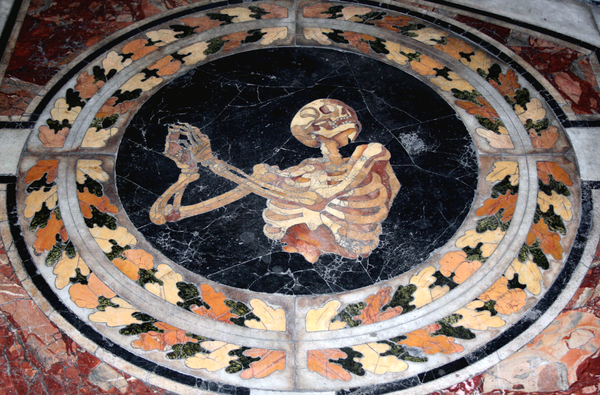 "Mosaic of a Skeleton Praying," detail from the marble floor of Cornaro Chapel (designed by Gian Lorenzo Bernini), at the Church of Santa Maria della Vittoria, Rome