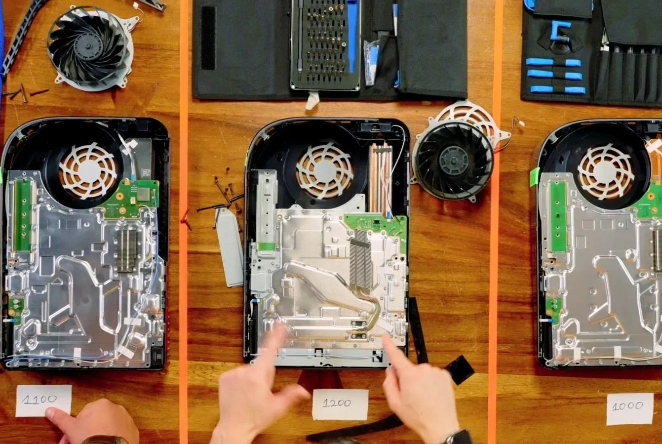 A PS5 being opened up and showing the internal parts