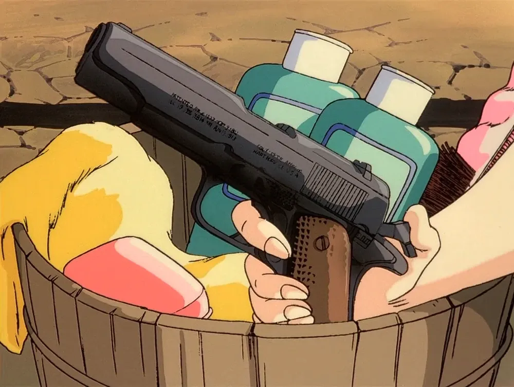 An image from Patlabor with a characters hand holding a highly detailed pistol that is sitting in a tub of bathing supplies.