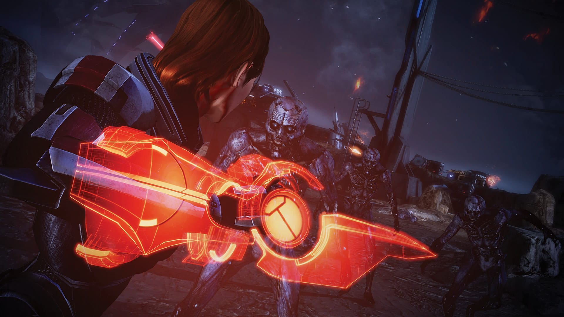Shepard fights off an army of Husks using a hard light blade attached to their armor in a screenshot from Mass Effect 3.