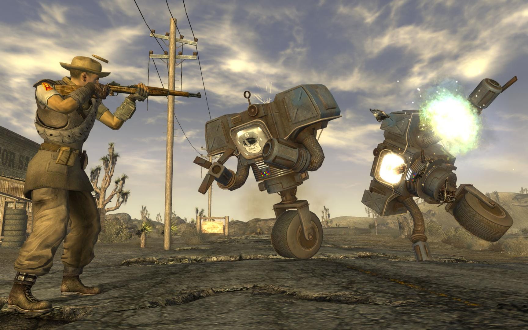 The Courier fights a couple of Protect-o-tronsin a screenshot from Fallout: New Vegas