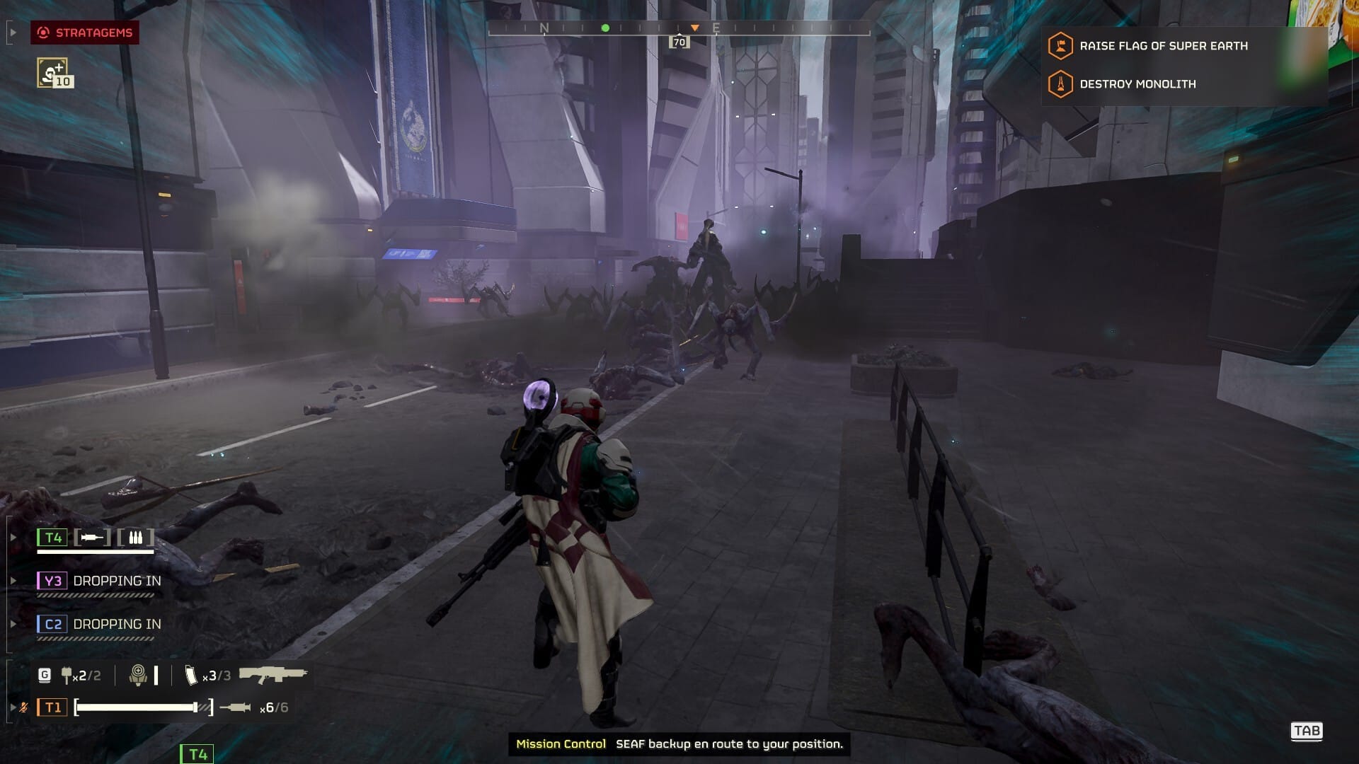 A Helldiver faces down a swarm of Wretches and a Crusher in the city streets of Rirga Bay