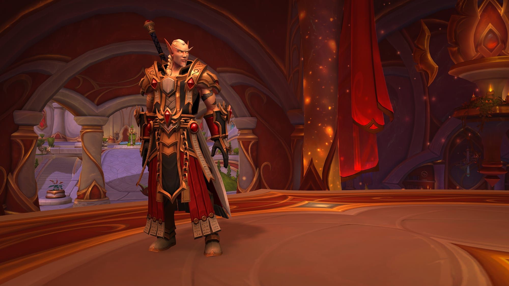 Arator the Redeemer, a blood elf Paladin wearing a modified version of Judgment armor to show his tattooed arms, stands in Silvermoon City.