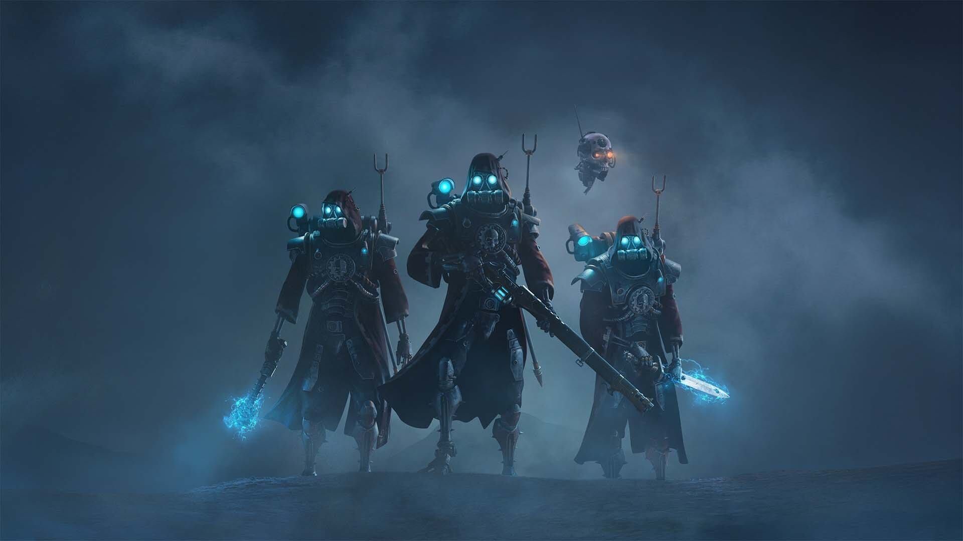 The Skitarii emerge out of the mist in a reveal trailer for Warhammer 40K: Darktide. The transhumanist warriors have red robes, bright blue eyes, and augmented limbs.