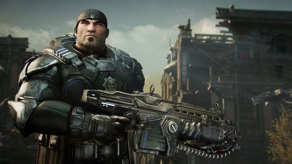Marcus stands with a Lancer in Gears of War: Reloaded