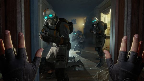 Alyx is appearing to surrender to three Combine soldiers in an abandoned apartment in a screenshot from Half-Life: Alyx