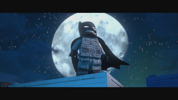 Screenshot of Batman in front of the moon
