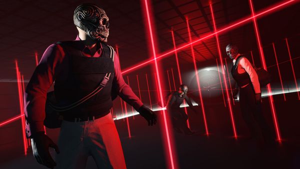 A crew of players wearing ornate skull masks and suits work their way through an elaborate maze grid in a screenshot from GTA Online's Kortz Center heist.