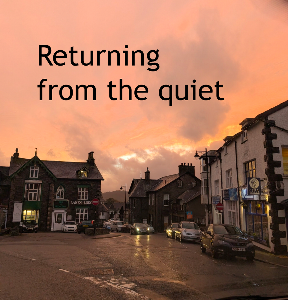 sunset over street scene Windermere Lake District