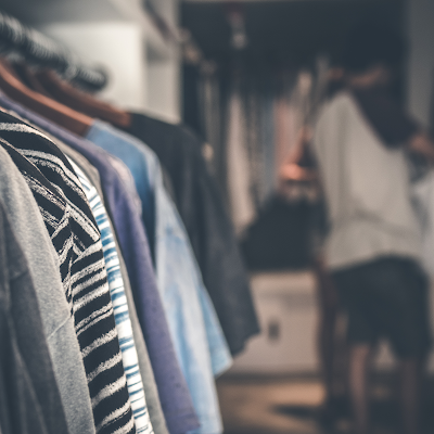 Closet full of old and new clothes. 